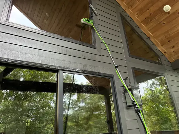 wide view of large lake view windows after cleaning at a Drasco Arkansas lakehouse