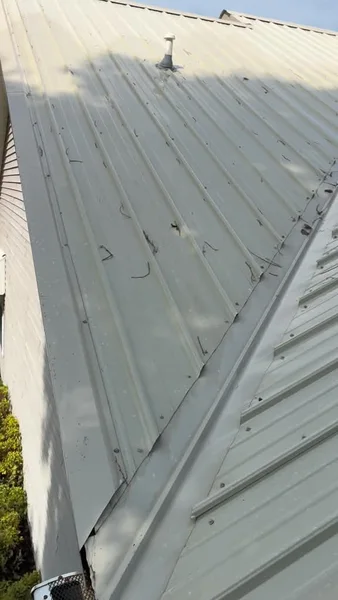 After - the same back roof section at the metal-roof soft-washing job in Allison, AR